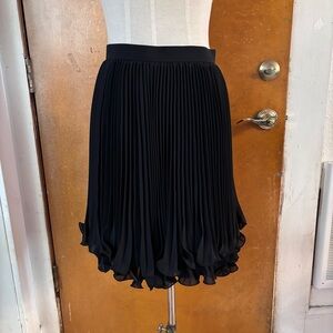 Black frilly pleated accordion skirt.   Size 9.  Double tulip hem
